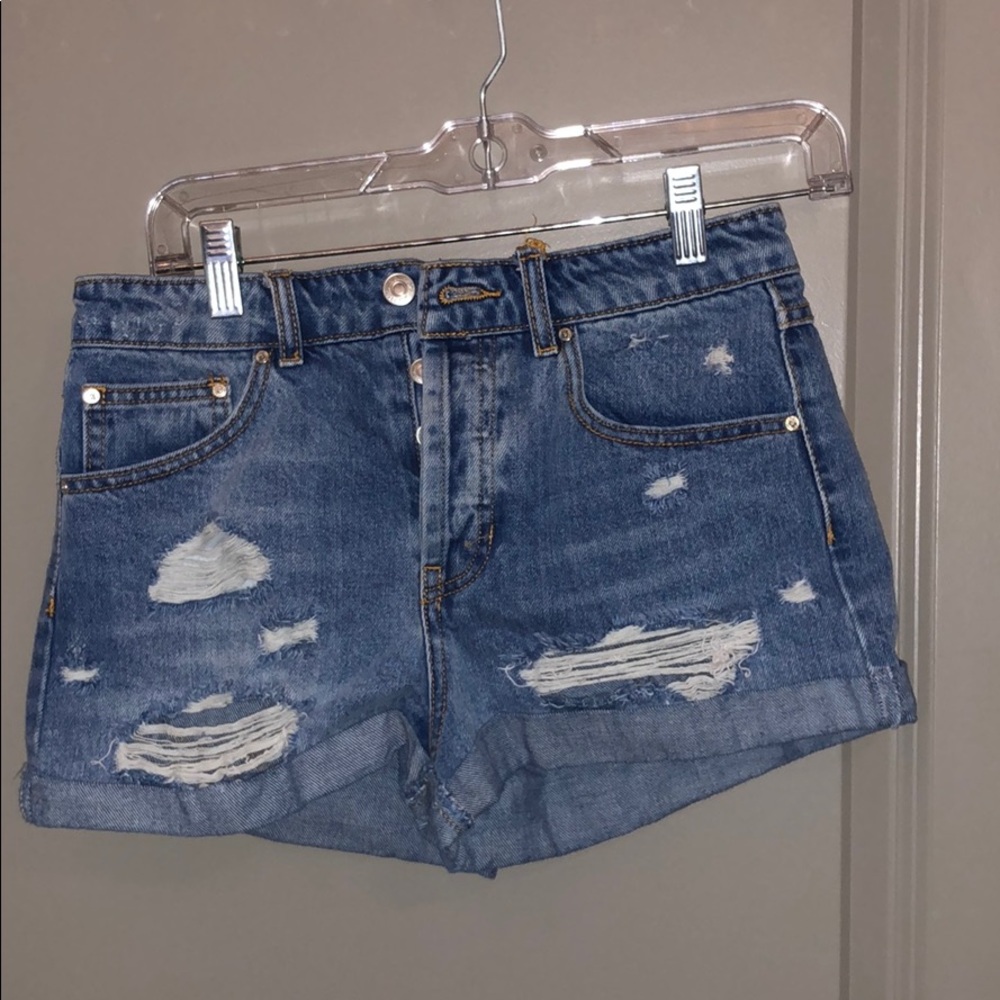 Blue ripped jean shorts